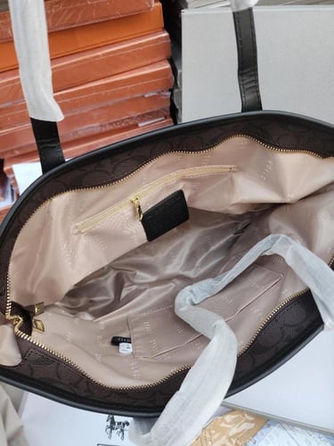 حقايب يد نسائية من ماركة كوتش ( Coach New work)