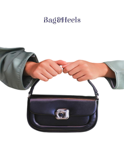 ‎ شنطة نسائية باللون الأسود