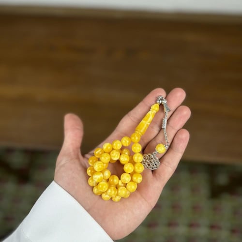 سبحة بكلايت اصفر معرق غامق