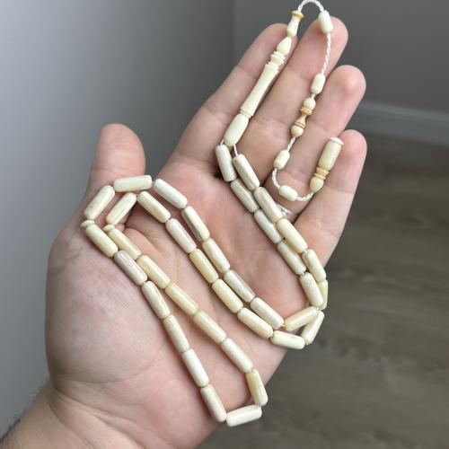Ostrich bone rosary with olive oil