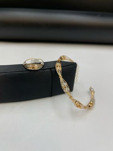 اسوارة مع خاتم ذهب صافي عيار18