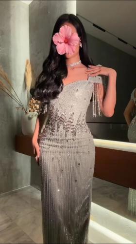 فستان سهرة كلفه تطريز يدوي كرستال وخرز مع شراشيب ا...