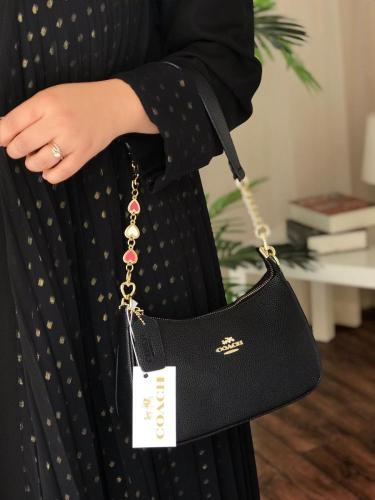 حقيبة كتف تيري من كوتش باللون الأسود