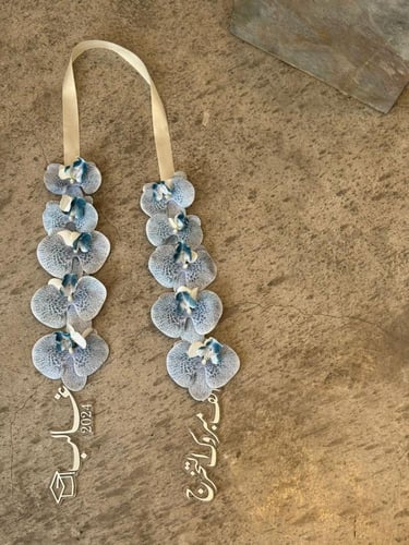 عقد تخرج من ورد الاوركيد -متجر الرياض