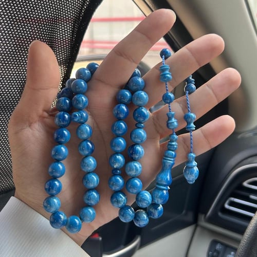 فاتوران تمليكه ازرق مموج