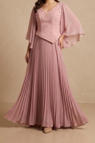 فستان سهرة وردي مطرز باللؤلؤ بليسيه