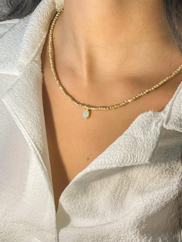 سلسالين ناعميين مطلي مزين بفص تراكوز … والثاني مطل...