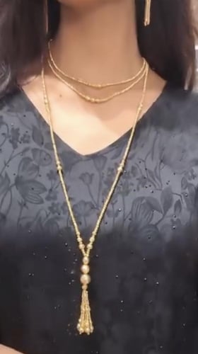 طقم الأناقة مطلي ذهب مكون من سلسال طويل وسلسالين أ...