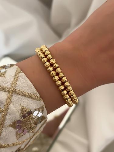 سوار دوريكا مزدوج مطلي ذهب عيار ٢١ .