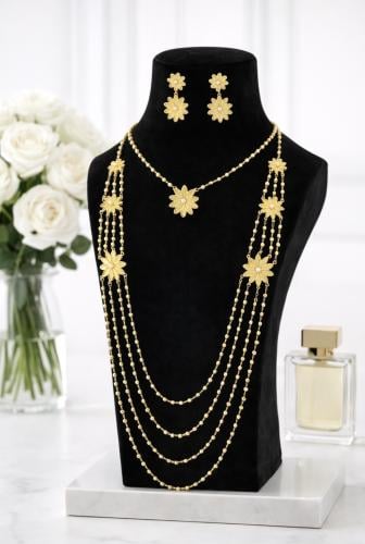 طقم فاخر مطلي بالذهب بتصميم الزهور الأنيق،