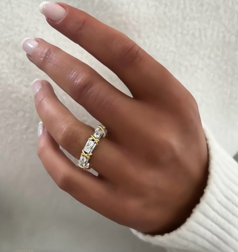 خاتم موديل XO بلون ذهبي وفضي مفتوح فري سايز .