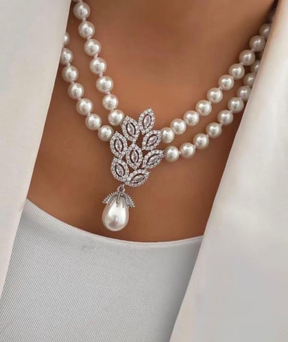 طقم لؤلؤ مطلي ذهب