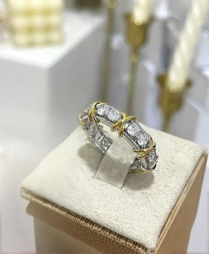 خاتم موديل XO بلون ذهبي وفضي مفتوح فري سايز .