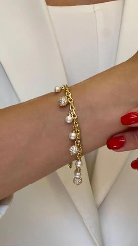 طقم بتصميم مزين بكرات ذهبية مغطاة بالزركون مع حبات...