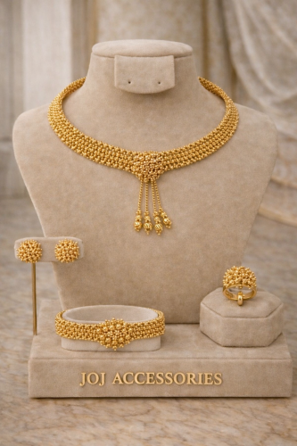 طقم بديل ذهب فاخر بتصميم زهرة مركزية ملكية.