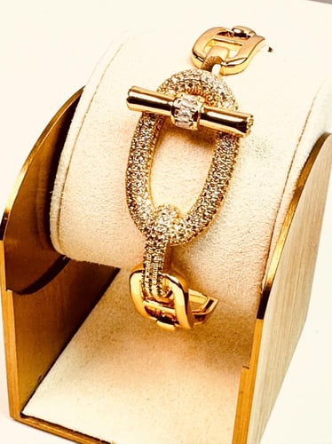 سوار وخاتم ذهبي بتصميم سلسلة