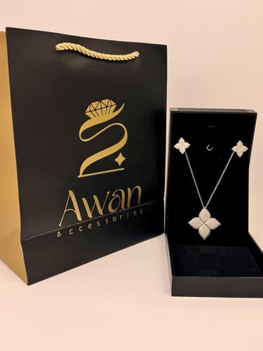 طقم سلسال سبحه فضي وحلق مستوحى من روبيرتو كوين