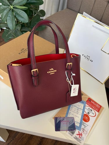 شنطه كوتش مع كامل ملحقاتها الوان اسود-عنابي -بني