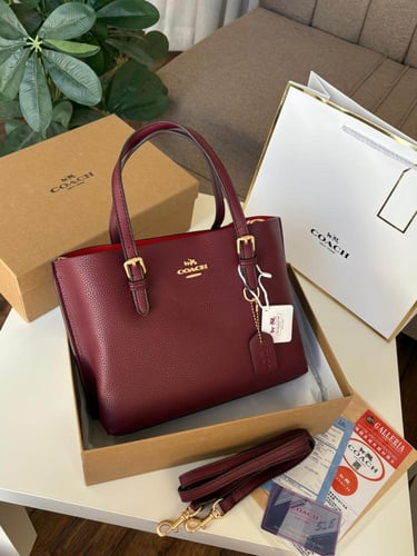 شنطه كوتش مع كامل ملحقاتها الوان اسود-عنابي -بني