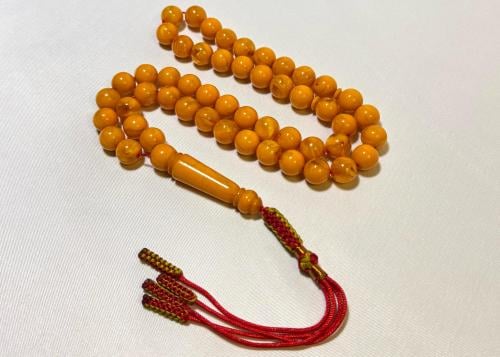 A misbaha with a Karkousha, Jaziri style, with eng...