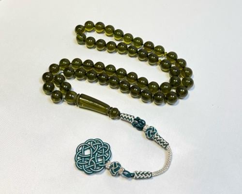 سبحة بكلايت طربزونه زيتي شفاف