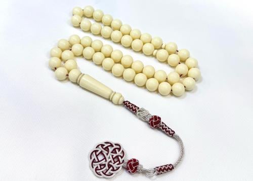 A tasbih with claid turban, caramel