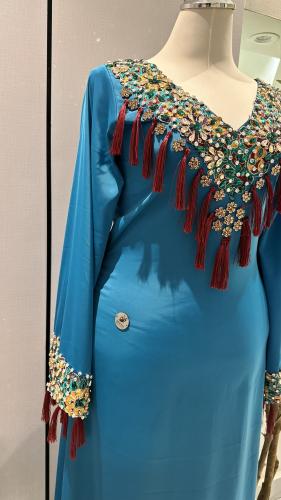 Kaftan with beads and tassels, turquoise color, made of Korean silk.