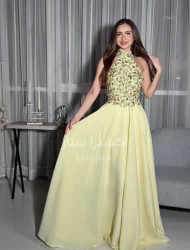 فستان سهرة أصفر بتطريز علوي لامع