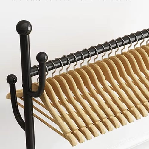 علاقة ملابس اسود معدن بعجلات متحركة بتصميم عصري