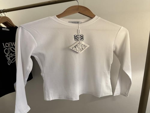 بلوزة لويفي ابيض