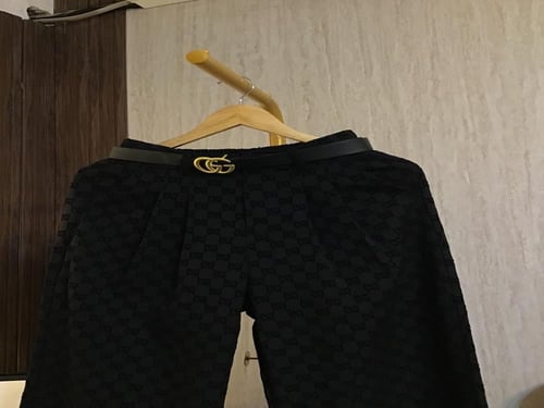 بنطلون قوتشي مع حزام نسائي