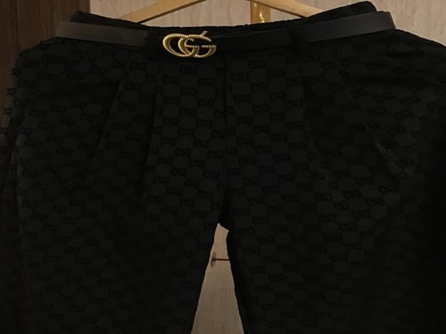 بنطلون قوتشي مع حزام نسائي