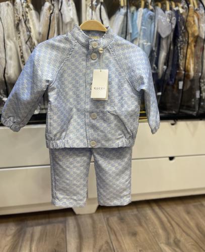 طقم قوتشي جاكيت + بنطلون