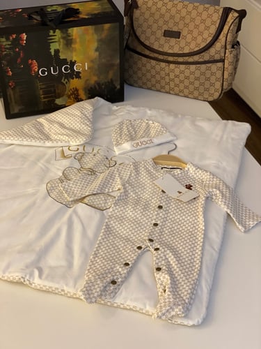 طقم مواليد قوتشي