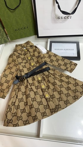 فستان قوتشي بشكل جاكيت مع حزام