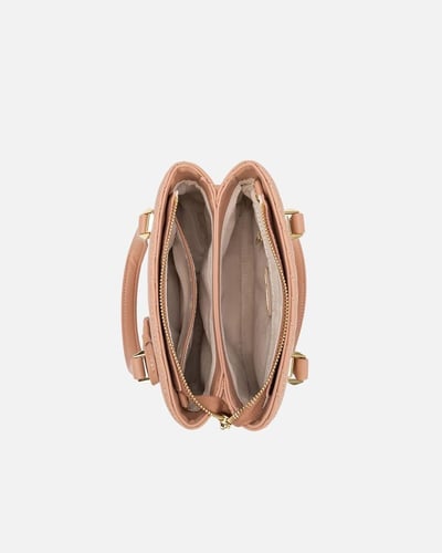 شنطة نسائية جلد باللون الوردي