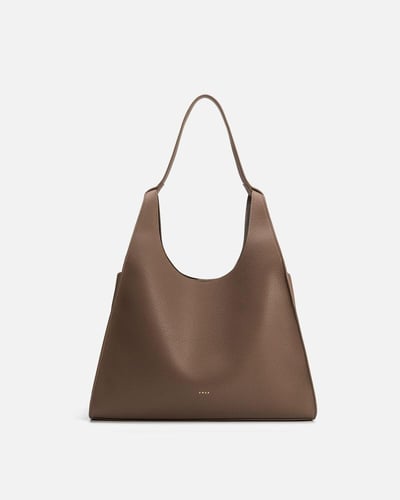 شنطة نسائية من الجلد بلون بني