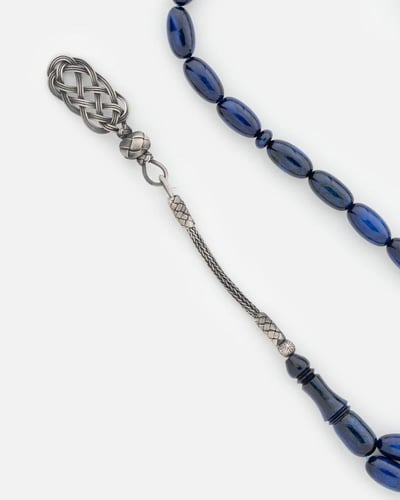 مسباح رجالي بلون كحلي وبأحجار الفاترون