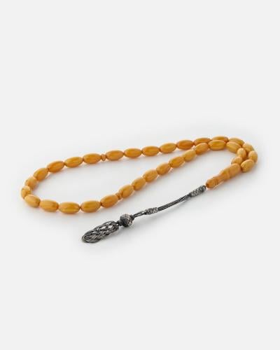 مسباح رجالي بلون أصفر وبأحجار الفاترون