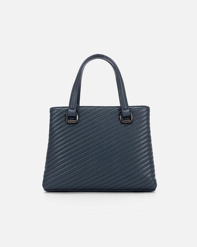 شنطة نسائية جلد باللون الأزرق