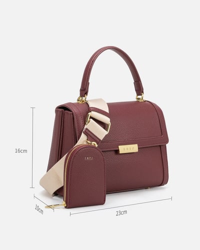 شنطة نسائية أنيقة باللون العودي