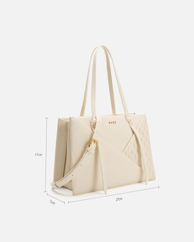 شنطة نسائية من الجلد باللون الأبيض