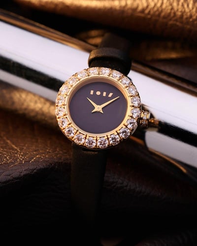 ساعة الفاتنة من الجلد بلون أسود