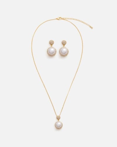 طقم نسائي راقي باللون الذهبي