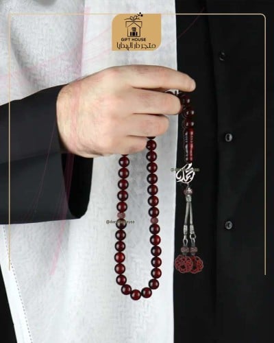 مسبحة بالاسم رجاليه