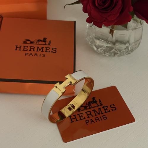 اساور ايرميز عريض ذهبي ابيض