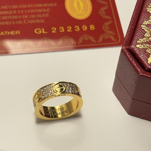 خاتم كارتير لوف نسائي ذهبي ستيل عريض مرصع بالكامل