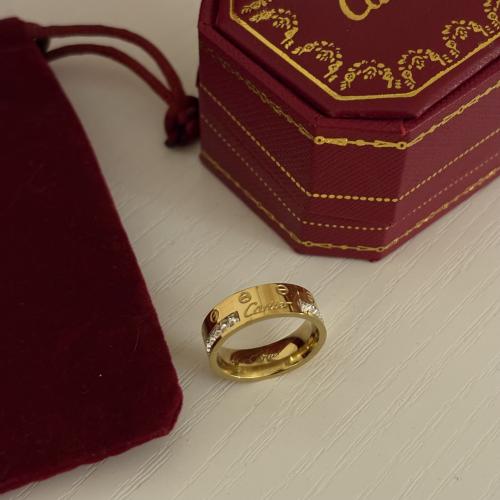 خاتم كارتير لوف نسائي ذهبي ستيل محفور بالاسم مرصع