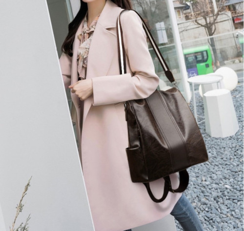 شنطه ظهر جلد لونين بني - اسود