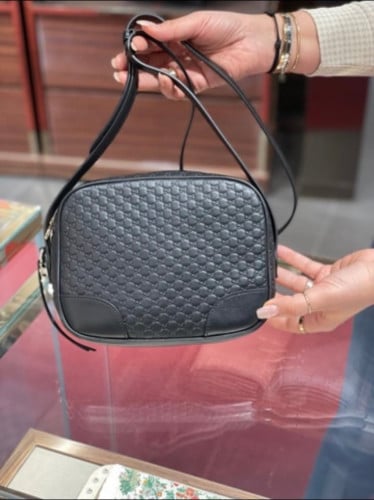 قوتشي كروس اسود